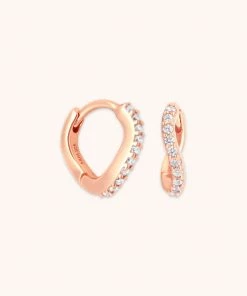 Astrid & Miyu Wave Crystal Huggies In Rose Gold