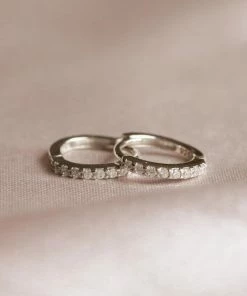 Astridandmiyu Best Sellers Crystal Jewelled Huggies In Silver