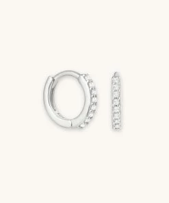 Astridandmiyu April Birthstone Huggies In Silver With Clear CZ