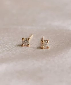 Astridandmiyu April Birthstone Stud Earrings In Gold With Clear CZ
