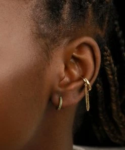 Astridandmiyu Best Sellers May Birthstone Huggies In Gold With Emerald CZ 11 Astridandmiyu Best Sellers May Birthstone Huggies In Gold With Emerald CZ