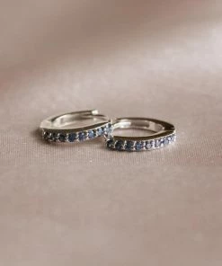 Astrid & Miyu December Birthstone Huggies In Silver With Tanzanite CZ