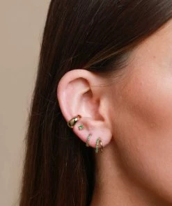 Astrid & Miyu Duo Emerald Huggies In Gold