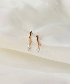 Astrid & Miyu Best Sellers Navette Charm Huggies In Gold