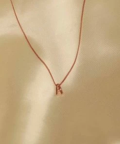 Astrid & Miyu Necklaces A Initial Pendant Necklace In Rose Gold With A