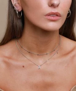 Astrid & Miyu A Initial Pendant Necklace In Silver With A