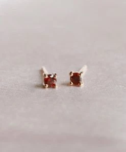 Astrid & Miyu January Birthstone Stud Earrings In Gold With Garnet CZ