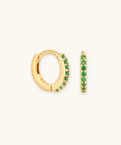 Astridandmiyu Best Sellers May Birthstone Huggies In Gold With Emerald CZ
