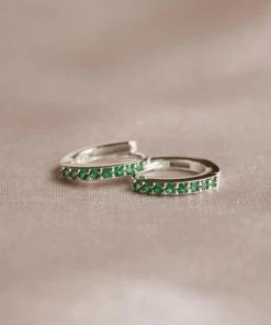 Astridandmiyu May Birthstone Huggies In Silver With Emerald CZ 10 Astridandmiyu May Birthstone Huggies In Silver With Emerald CZ