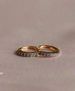 Astrid & Miyu Birthstone Earrings September Birthstone Huggies In Gold With Sapphire CZ