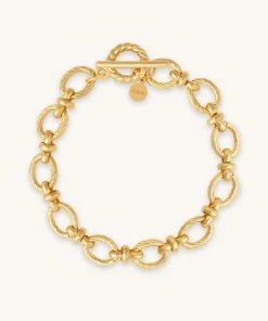 Astrid & Miyu Textured Oval Link T-Bar Bracelet In Gold