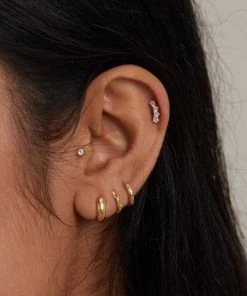 Astridandmiyu Curved Crystal Barbell In Gold Earrings