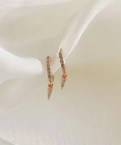 Astrid & Miyu Crystal Spike Huggies In Gold Earrings 10 Astrid & Miyu Crystal Spike Huggies In Gold Earrings