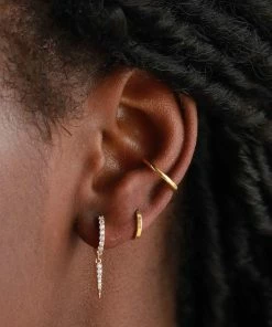 Astrid & Miyu Crystal Spike Huggies In Gold Earrings