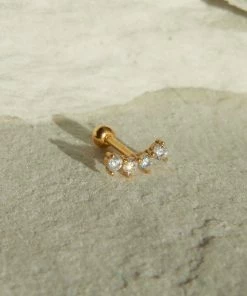 Astridandmiyu Curved Crystal Barbell In Gold Earrings