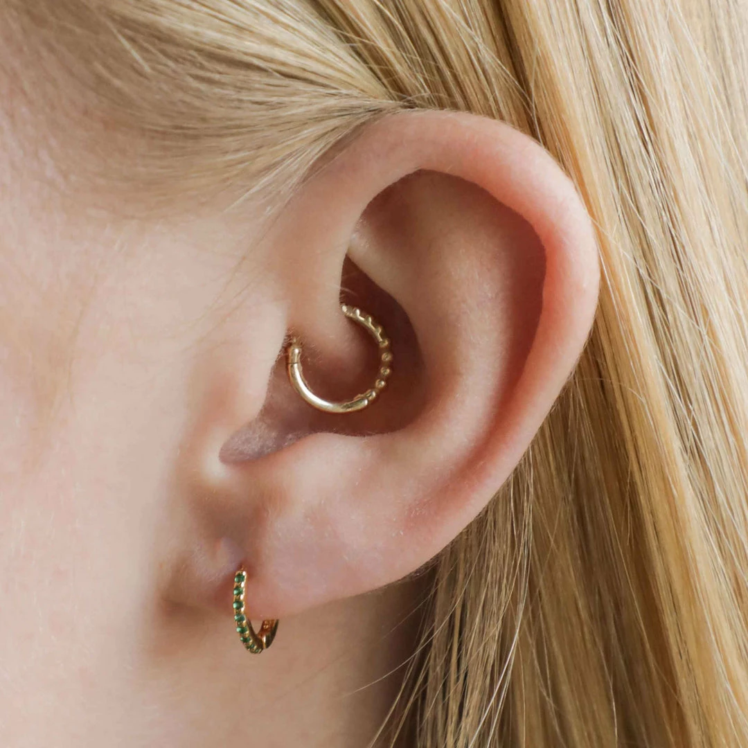 Astridandmiyu Best Sellers May Birthstone Huggies In Gold With Emerald CZ 5 Astridandmiyu Best Sellers May Birthstone Huggies In Gold With Emerald CZ