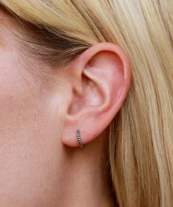 Astridandmiyu May Birthstone Huggies In Silver With Emerald CZ 12 Astridandmiyu May Birthstone Huggies In Silver With Emerald CZ