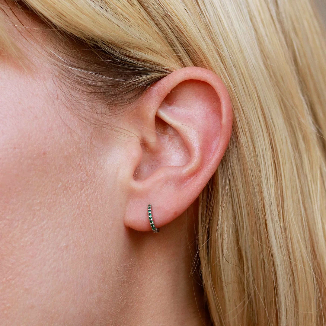 Astridandmiyu May Birthstone Huggies In Silver With Emerald CZ 7 Astridandmiyu May Birthstone Huggies In Silver With Emerald CZ