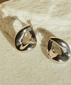 Astridandmiyu Best Sellers Molten Hoops In Silver